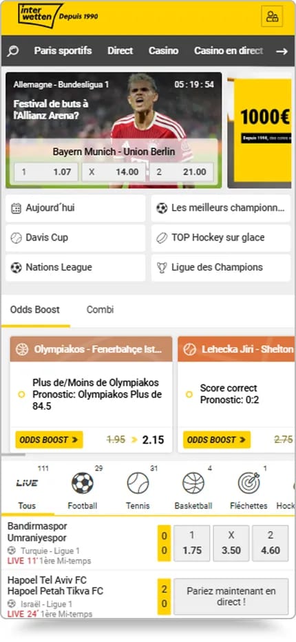 Interface d’Interwetten présentant des paris sportifs, des cotes boostées et plusieurs matchs de football en direct avec scores et cotes 1X2.